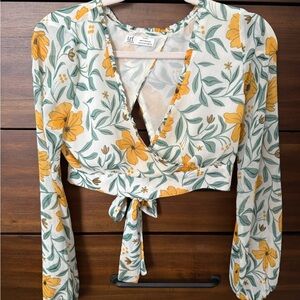 Floral Top in Yellow and Green cropped with bow tie in back. Cropped